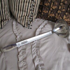 large stainless steel ladle